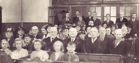 Wesleyan Chapel congregation Back row: Mr. Shorocks, Edward Nichols, Leonard Nichols, (girl unknown), (man's head unknown), Jasper Green, John Cowley, Mr. Faulkner, Alfred Richardson Third row: unknown, Mrs. Robinson, Mr. Coleman, Miss Arrowsmith, Miss Rainbow, (Ginny?) Cowley, unknown, Gladys Stones, Mr. Sprittles, Lilly Mothersole, Mrs. Green (Fred Green's mother), Frances Green (wife of Jasper Green), Nora Cowley, Mrs. Lambert, Mrs. Beckett (Bletchley), Connie Cowley, Mrs. Ratledge Second row: unknown, Mrs. Olney?, John Olney, Mr. Mills, unknown, unknown Front row left to right: Betty Gray, Pam Markham, Joy Hall, Jean Lambert, Arthur Lambert