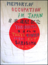 A silk flag brought back from Japan by George