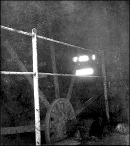 Mill interior showing the water wheel