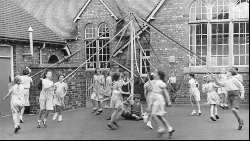 Castlethorpe School pupils Maypole dancing at the school in 1952
