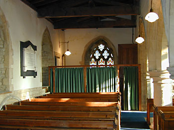 The north aisle with a screened off vestry that was formerly a chapel and burial place for the FitzRoy family.
