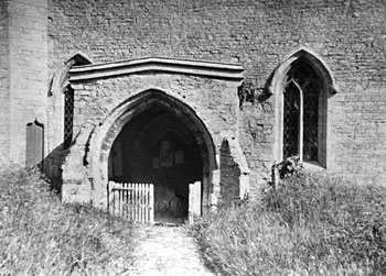 an old picture of the porch showing the wooden gates to keep the sheep out.