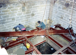Erecting the steel frame in 1990.