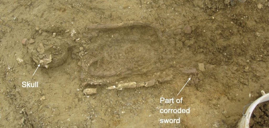 Viking burial with sword