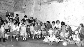 Members of the public sheltering from the weather in the barn at The Lodge 