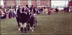 Ben Sawbridge arriving as John Bull,  in a pony and trap.