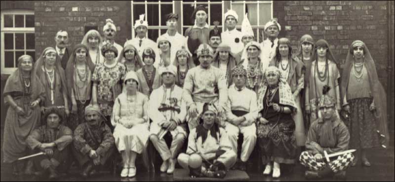 Castlethorpe Choral Society Back row left to right: Mr. Middleton, Elsie Booth, unknown, Mr. Clarke, Arthur Cowley, Fred Green, Burt Evans Middle row: Mrs. Clarke, Rene Harding, Connie Cowley, unknown, Mrs. Matlby?, Connie Clarke, Elsie Richardson, Grace Olney, Hilda Rawlinson, Mrs. Evans, Nellie Cook, Connie Robinson, Nellie Maltby, Bessie Panter Front Row: Unknown, unknown, unknown, Jessie Nichols, John Rainbow, John Cowley, Mrs. Nellie Maltby, unknown, Seated front Harry Clarke