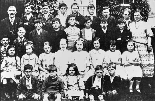 Back Row: Mr. Middleton, Les Limbrey, Horace Limbrey, Eric Kingston, Jim Carpenter, Douglas Powell, Fred Mills, Sam West, Mrs. Middleton Boys Row: Charlie Bavington, unknown, Bill Marks, Harold Cook, Frank Bavington, Bob Bavington, Len Robinson, Hayden Davidge? Girls Row: Kath Marks, Gladys Stones, Ruby Maltby, Gertie Algar, Winnie Woodward, Connie Waring, Marjorie Bavington, Elsie Stones Front Row: Ralph Walton, Tom Mayes, Florence Marks, Harry Woodward, Stan Nichols