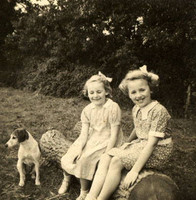  My two sisters. Looks like the field immediately behind School House.