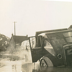 Tathall End, Lorry stuck in the flood at Tathall End c.1950