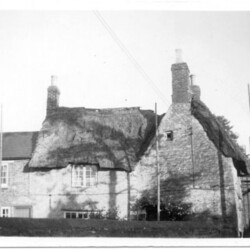 12 Market Square  Replacing the thatch with Tiles.
c.1970
