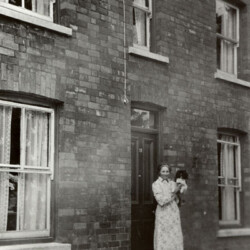 Mrs. Clare Adams nee Rainbow, outside 18 Park Road in 1950s