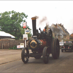 Steam engine in procession along the High Street c.1985