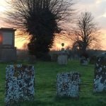 Sunset over graveyard