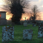 Sunset over graveyard