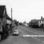 High Street North,1960s. Note the Crown and Castle pub sign has been removed. High Street North,1960s. Note the Crown and Castle pub sign has been removed.
