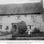 Yew Tree Farm circa September 1919. Emma Jane Middleweek (nee Tillyard) is holding her daughter Phyllis (Rollinson). Mr and Mrs Middleweek moved into Yew Tree Farm in 1915.