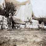 Rear view of Yew Tree Farm circa 1925. Frances (Frank) Middleweek, Emma Jane Middleweek in the background. Yew Tree Farm
