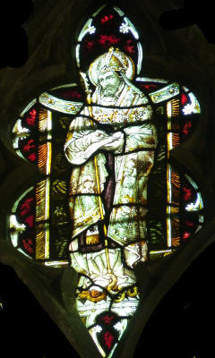A4. St Patrick with snakes under foot.