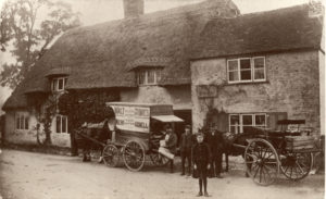 The Swan Inn with delivery van during the First World War.