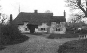 The Swan Inn about 1920 with old Post Office to the right
