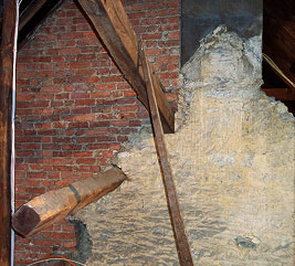 limestone wall and victorian rafters