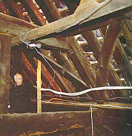 Bryan Egan looking at the array of medieval beams