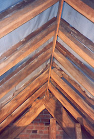 Truss VII north east corner showing lead lined trough carrying rain water from gutter.