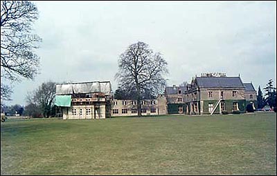 Long shot of new building c. 1980 before the addition of the gymnasium.