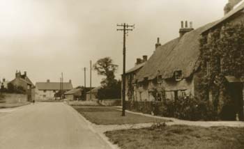 Thatched Cottages near right